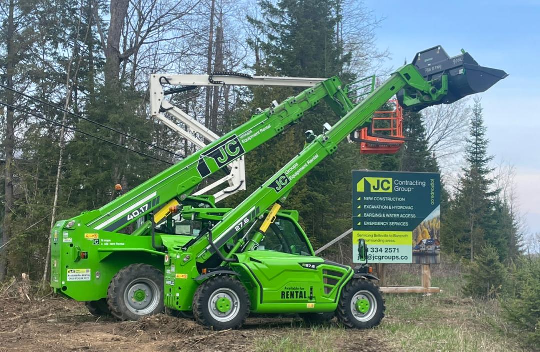 Green telehandler at a jobsite